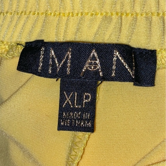 IMAN slacks in canary yellow with elastic waist and room in the boot. Soft sexy. - Picture 2 of 6